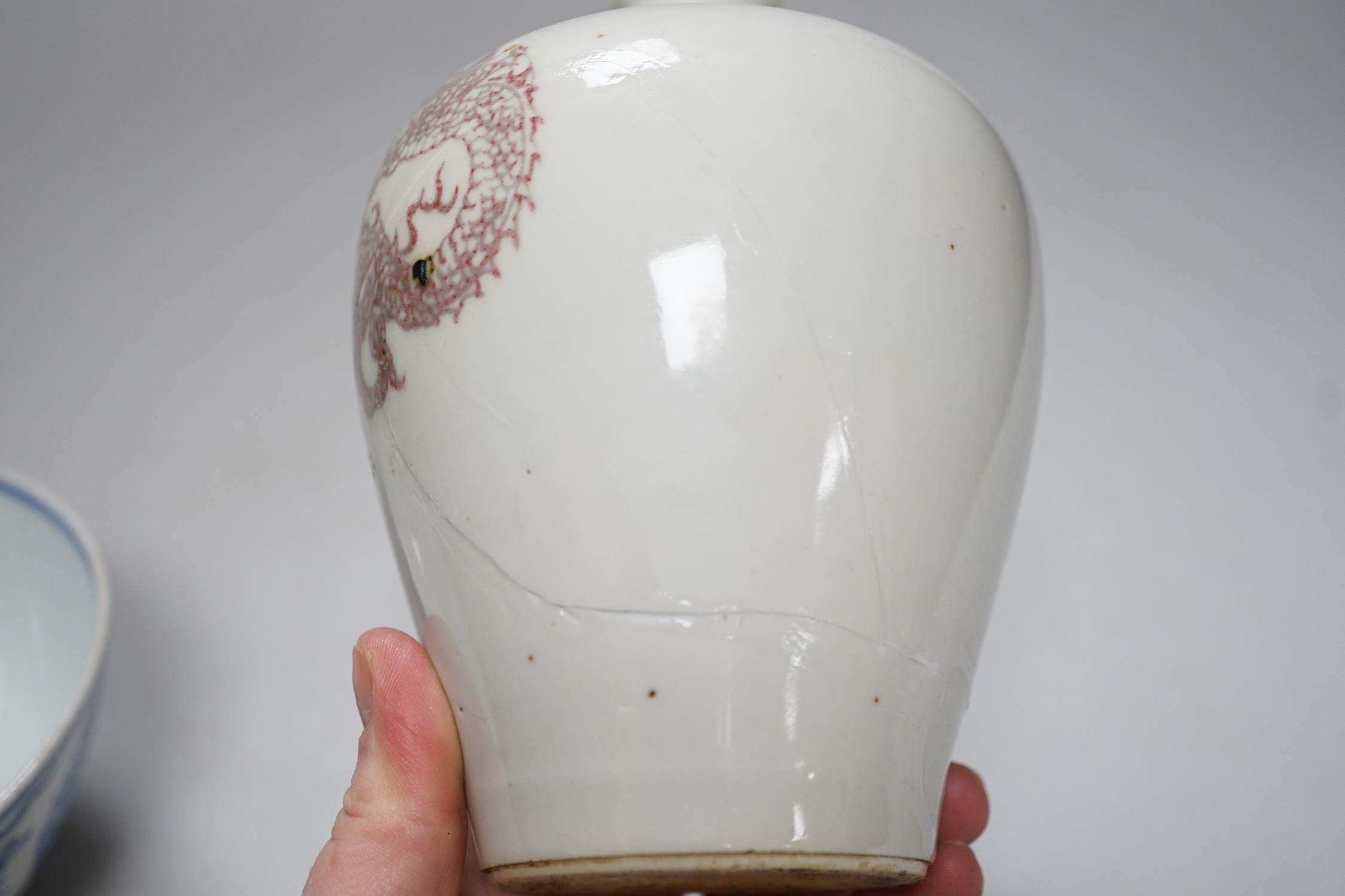 A Chinese underglaze copper red meiping a.f. and a Chinese blue and white bowl. Tallest 15cm